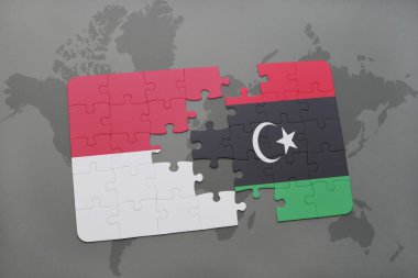 bir dünya haritası arka plan üzerinde Endonezya ve Libya ulusal bayrağı ile bulmaca.