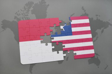 bir dünya haritası arka plan üzerinde endonezya ve liberya ulusal bayrağı ile bulmaca.