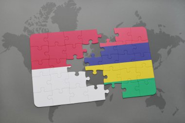 bir dünya haritası arka plan üzerinde endonezya ve mauritius ulusal bayrağı ile bulmaca.