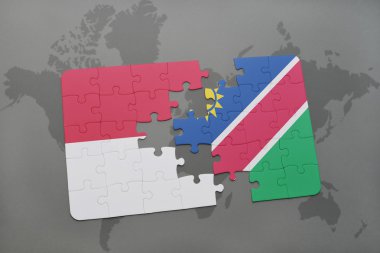 bir dünya haritası arka plan üzerinde endonezya ve namibya ulusal bayrağı ile bulmaca.