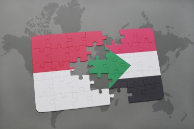 bir dünya haritası arka plan üzerinde endonezya ve sudan ulusal bayrağı ile bulmaca.
