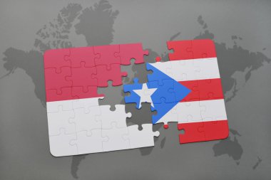 bir dünya haritası arka plan üzerinde endonezya ve porto riko ulusal bayrağı ile bulmaca.