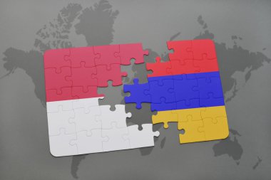 bir dünya haritası arka plan üzerinde Endonezya ve Ermenistan ulusal bayrağı ile bulmaca.