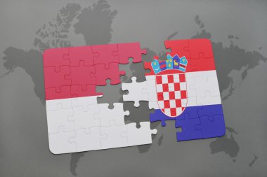 bir dünya haritası arka plan üzerinde endonezya ve hırvatistan ulusal bayrağı ile bulmaca.