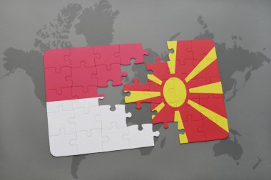 bir dünya haritası arka plan üzerinde endonezya ve makedonya ulusal bayrağı ile bulmaca.