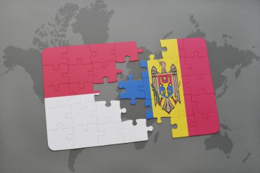 bir dünya haritası arka plan üzerinde endonezya ve moldova ulusal bayrağı ile bulmaca.