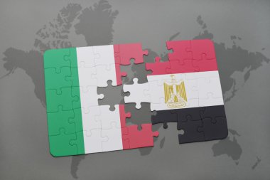 bir dünya haritası arka plan üzerinde İtalya ve Mısır ulusal bayrağı ile bulmaca.