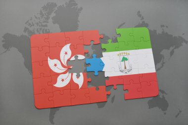 bir dünya haritası arka plan üzerinde hong kong ve ekvator ginesi ulusal bayrağı ile bulmaca.