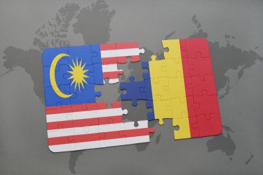 bir dünya haritası arka plan üzerinde malezya ve çad ulusal bayrağı ile bulmaca.