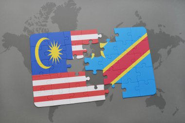 bir dünya haritası arka plan üzerinde Malezya ve Kongo Demokratik Cumhuriyeti ulusal bayrağı ile bulmaca.