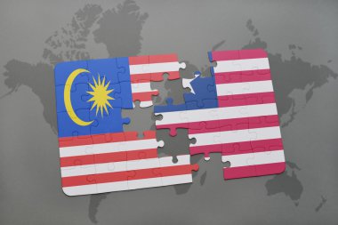 bir dünya haritası arka plan üzerinde malezya ve liberya ulusal bayrağı ile bulmaca.