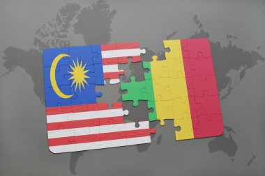 bir dünya haritası arka plan üzerinde malezya ve mali ulusal bayrağı ile bulmaca.