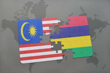 bir dünya haritası arka plan üzerinde malezya ve mauritius ulusal bayrağı ile bulmaca.