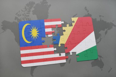 bir dünya haritası arka plan üzerinde malezya ve seyşeller ulusal bayrağı ile bulmaca.
