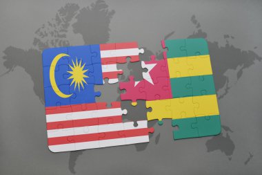 malezya ulusal bayrağı ile bulmaca ve bir dünya haritası arka plan üzerinde togo.