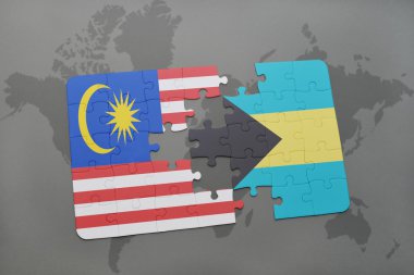 bir dünya haritası arka plan üzerinde malezya ve bahamalar ulusal bayrağı ile bulmaca.