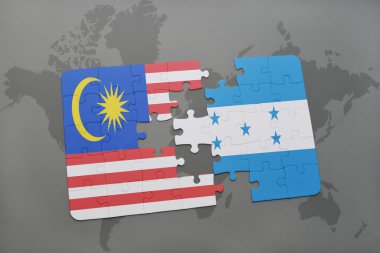 bir dünya haritası arka plan üzerinde malezya ve honduras ulusal bayrağı ile bulmaca.