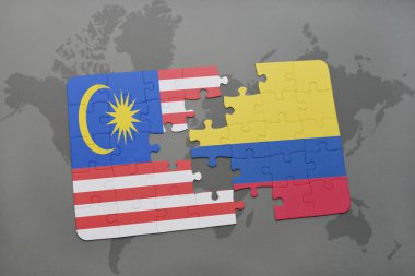 bir dünya haritası arka plan üzerinde Malezya ve Kolombiya ulusal bayrağı ile bulmaca.