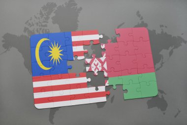 bir dünya haritası arka plan üzerinde malezya ve beyaz rusya ulusal bayrağı ile bulmaca.