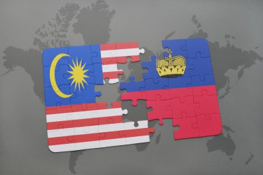 Malezya ve liechtenstein ulusal bayrak dünya harita arka plan üzerinde ile bulmaca.