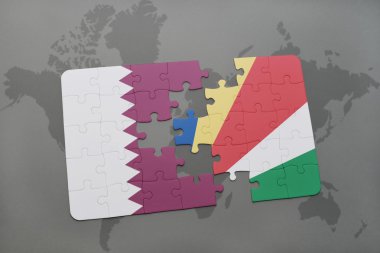 bir dünya haritası arka plan üzerinde katar ve seyşeller ulusal bayrağı ile bulmaca.
