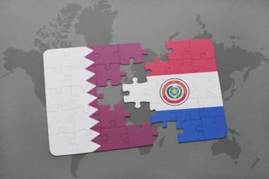 bir dünya haritası arka plan üzerinde Katar ve Paraguay ulusal bayrağı ile bulmaca.
