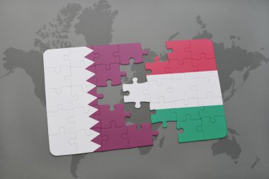 bir dünya haritası arka plan üzerinde Katar ve Macaristan ulusal bayrağı ile bulmaca.