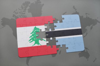bir dünya haritası arka plan üzerinde lübnan ve botsvana ulusal bayrağı ile bulmaca.
