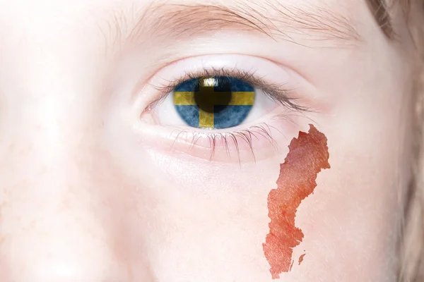 Mänskliga 's ansikte med flagga och karta Sverige. — Stockfoto