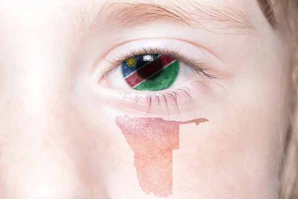 ナミビアの国旗と地図を持つ人間の顔. — ストック写真