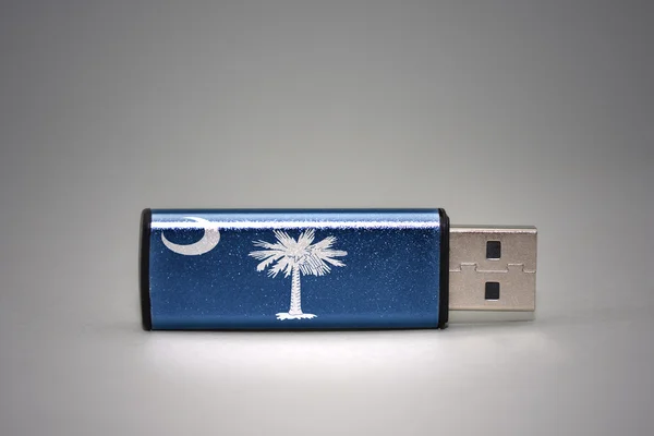 Usb flash drive with the south carolina state flag on gray background. — Stock Photo, Image