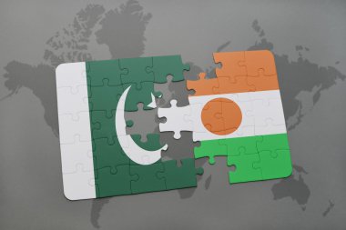 bir dünya haritası arka plan üzerinde pakistan ve nijer ulusal bayrağı ile bulmaca.