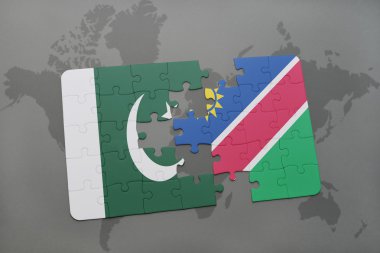 bir dünya haritası arka plan üzerinde pakistan ve namibya ulusal bayrağı ile bulmaca.