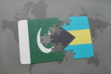 bir dünya haritası arka plan üzerinde pakistan ve bahamalar ulusal bayrağı ile bulmaca.