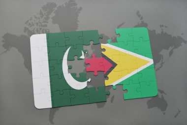 bir dünya haritası arka plan üzerinde pakistan ve guyana ulusal bayrağı ile bulmaca.