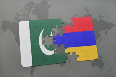 bir dünya haritası arka plan üzerinde Pakistan ve Ermenistan ulusal bayrağı ile bulmaca.