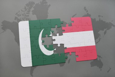 bir dünya haritası arka plan üzerinde Pakistan ve Avusturya ulusal bayrağı ile bulmaca.