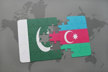bir dünya haritası arka plan üzerinde pakistan ve azerbaycan ulusal bayrağı ile bulmaca.