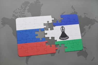 bir dünya haritası arka plan üzerinde Rusya ve lesotho ulusal bayrağı ile bulmaca.