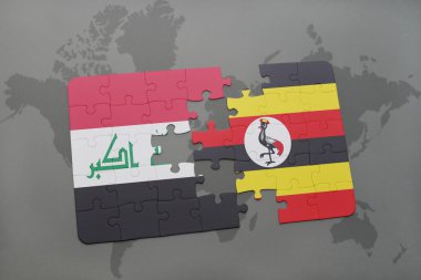 bir dünya haritası arka plan üzerinde Irak ve Uganda ulusal bayrağı ile bulmaca.
