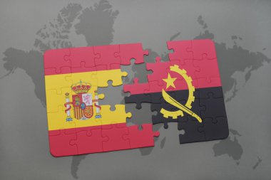 bir dünya haritası arka plan üzerinde İspanya ve angola ulusal bayrağı ile bulmaca.
