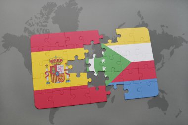 bir dünya haritası arka plan üzerinde İspanya ve komor ulusal bayrağı ile bulmaca.