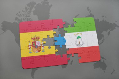 bir dünya haritası arka plan üzerinde İspanya ve ekvator ginesi ulusal bayrağı ile bulmaca.
