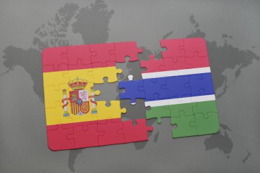 bir dünya haritası arka plan üzerinde İspanya ve gambiya ulusal bayrağı ile bulmaca.