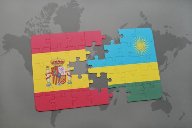 bir dünya haritası arka plan üzerinde İspanya ve Ruanda ulusal bayrağı ile bulmaca.