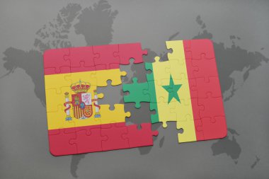 bir dünya haritası arka plan üzerinde İspanya ve Senegal ulusal bayrağı ile bulmaca.