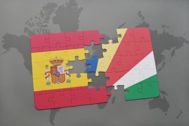 bir dünya haritası arka plan üzerinde İspanya ve seyşeller ulusal bayrağı ile bulmaca.