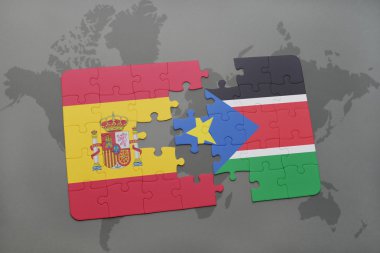 İspanya ve dünya harita arka plan üzerinde Güney sudan bayrağı ile bulmaca.