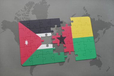 bir dünya haritası arka plan üzerinde ürdün ve gine bissau ulusal bayrağı ile bulmaca.