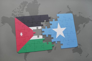 bir dünya haritası arka plan üzerinde ürdün ve somali ulusal bayrağı ile bulmaca.